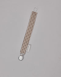 Pacifier holder check