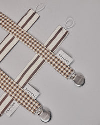 Pacifier holder check